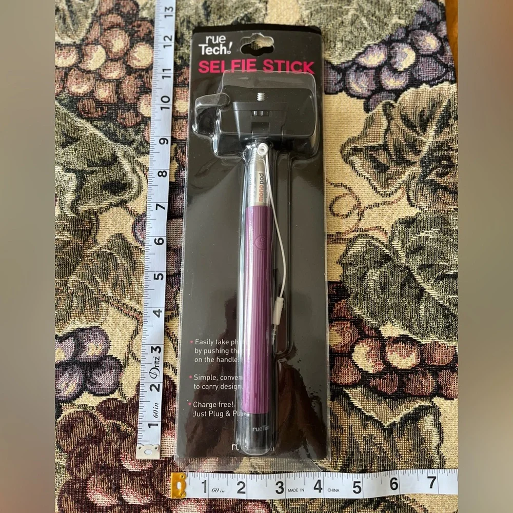 Selfie Stick by Rue 21. Purple New in original package.